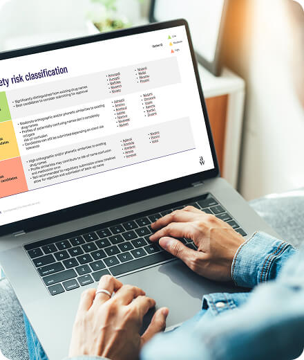 Drug safety risk classification chart on a laptop