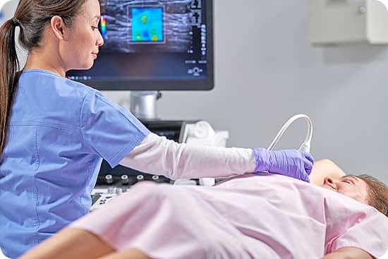 Image of an ultrasound being done on a patient's chest