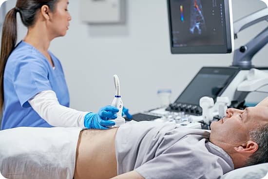 Image of an ultrasound being done on a patient's abdomen